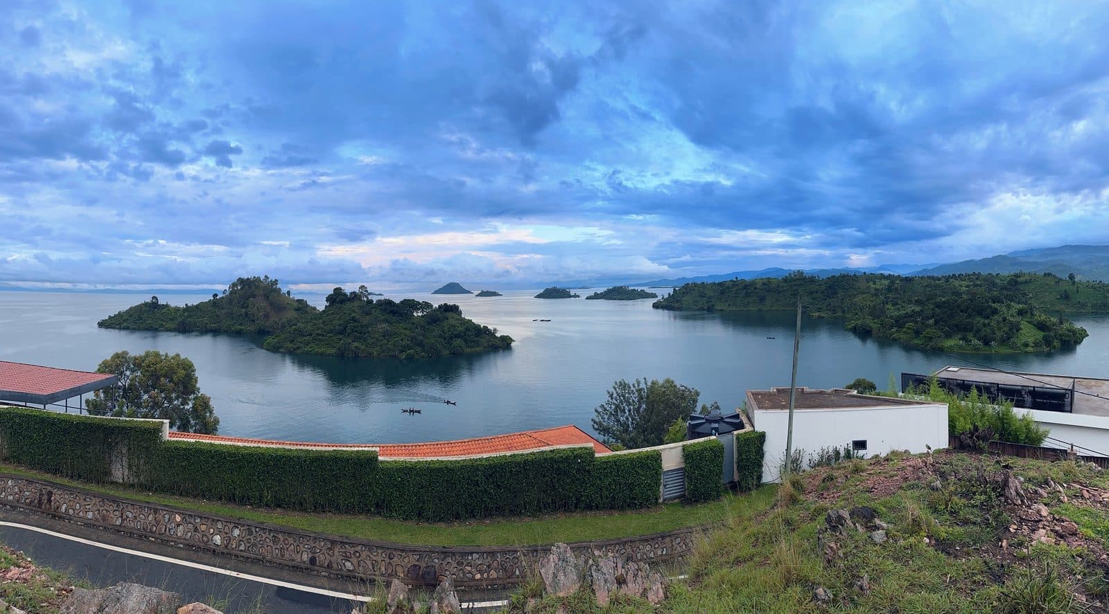 A wide view across Lake Kivu, with hills rising behind the far shore